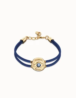 Pulsera doble de cuero azul con ojo bañado en oro 18k