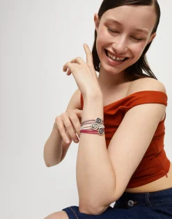 Pulsera doble de cuero blanco con ojo bañado en plata de ley
