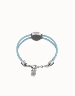 Pulsera doble de cuero celeste con ojo bañado en plata de ley
