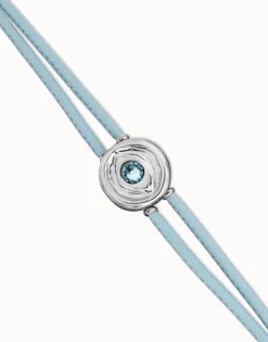 Pulsera doble de cuero celeste con ojo bañado en plata de ley
