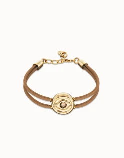 Pulsera doble de cuero crema con ojo bañado en oro 18k