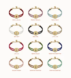 Pulsera doble de cuero crema con ojo bañado en plata de ley
