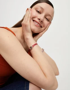 Pulsera doble de cuero lila con ojo bañado en plata de ley