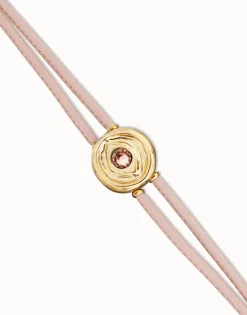 Pulsera doble de cuero rosa con ojo bañado en oro 18k