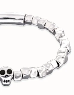 Pulsera elástica bañada en plata de ley con una calavera