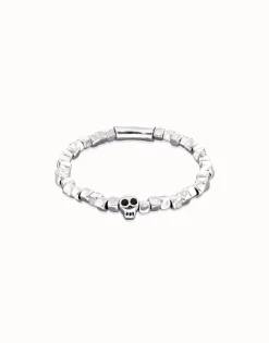 Pulsera elástica bañada en plata de ley con una calavera
