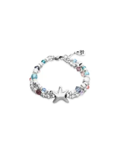 Pulsera elástica bañada en plata con cristales facetados y estrella de mar