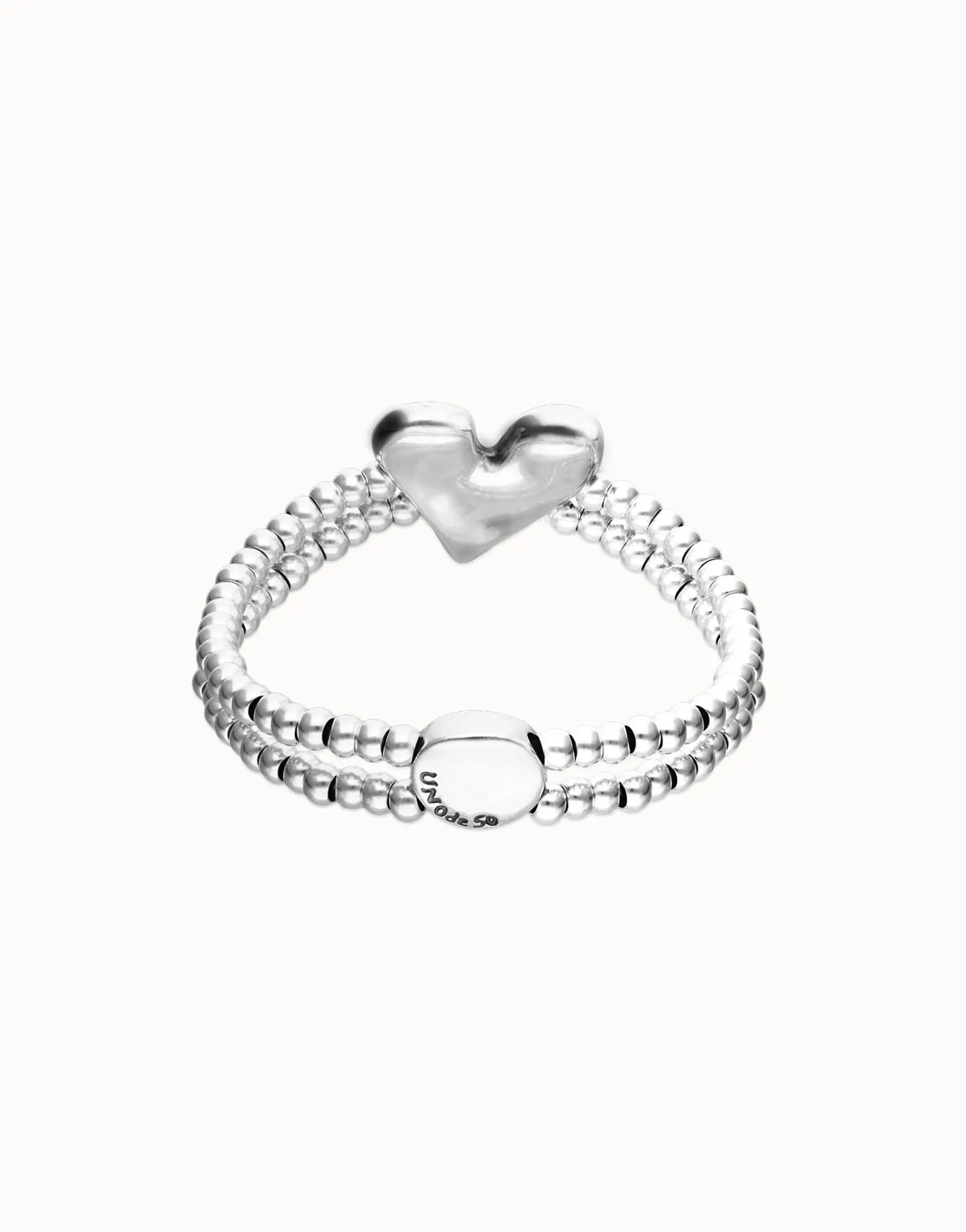 Pulsera elástica doble bañada en plata de ley con detalle de corazón