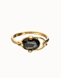 Pulsera rígida bañada en oro 18k con cristal facetado ovalado gris