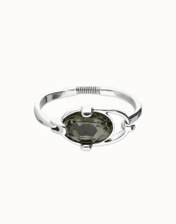 Pulsera rígida bañada en plata de ley con cristal facetado ovalado gris