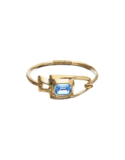 Pulsera semirrígida bañada en oro 18k con cristal facetado azul